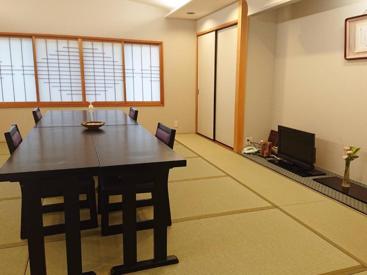 Kagetsu Ryokan Maizuru Rum bild